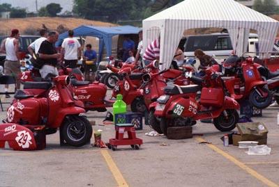 The Lucky Seven pits at an ASRA scooter race at Adams Raceway in Riverside, California, 1992